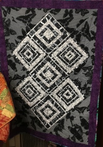 Feathers quilt after finishing